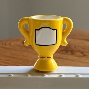 Nora Fleming Winner, Winner Yellow Ceramic Trophy-Shaped mini- Retired